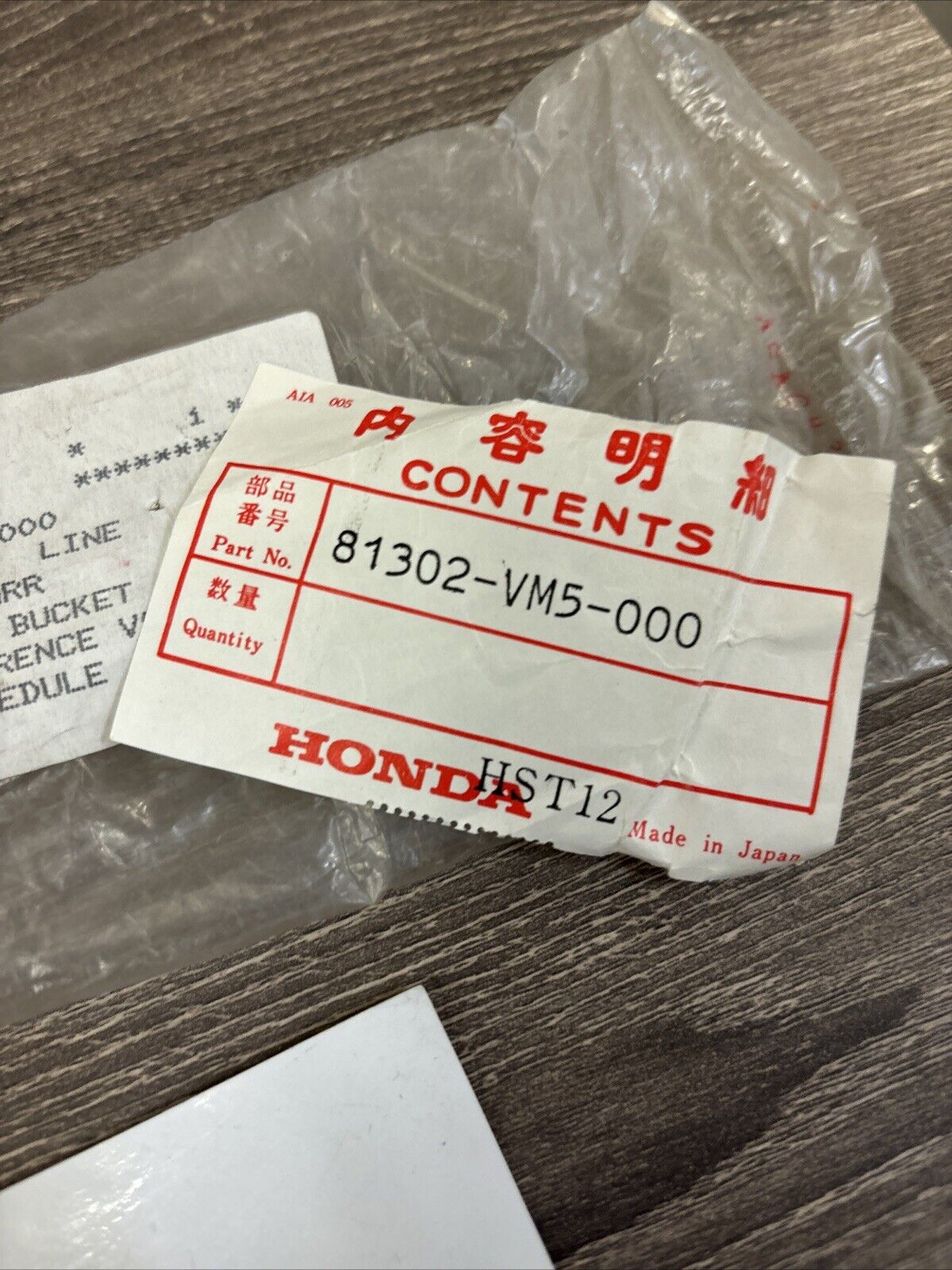 NOS Honda TRX200 TRX250 REAR CARRIER SUPPORT 81302-VM5-000 H119