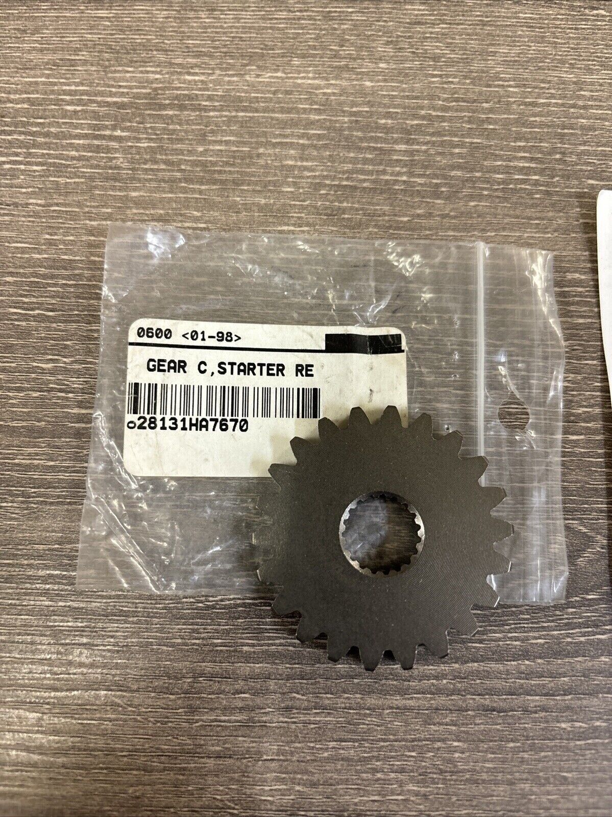 NOS Honda 1986 TRX350 STARTER REDUCTION GEAR C 22T 28131-HA7-670 H118