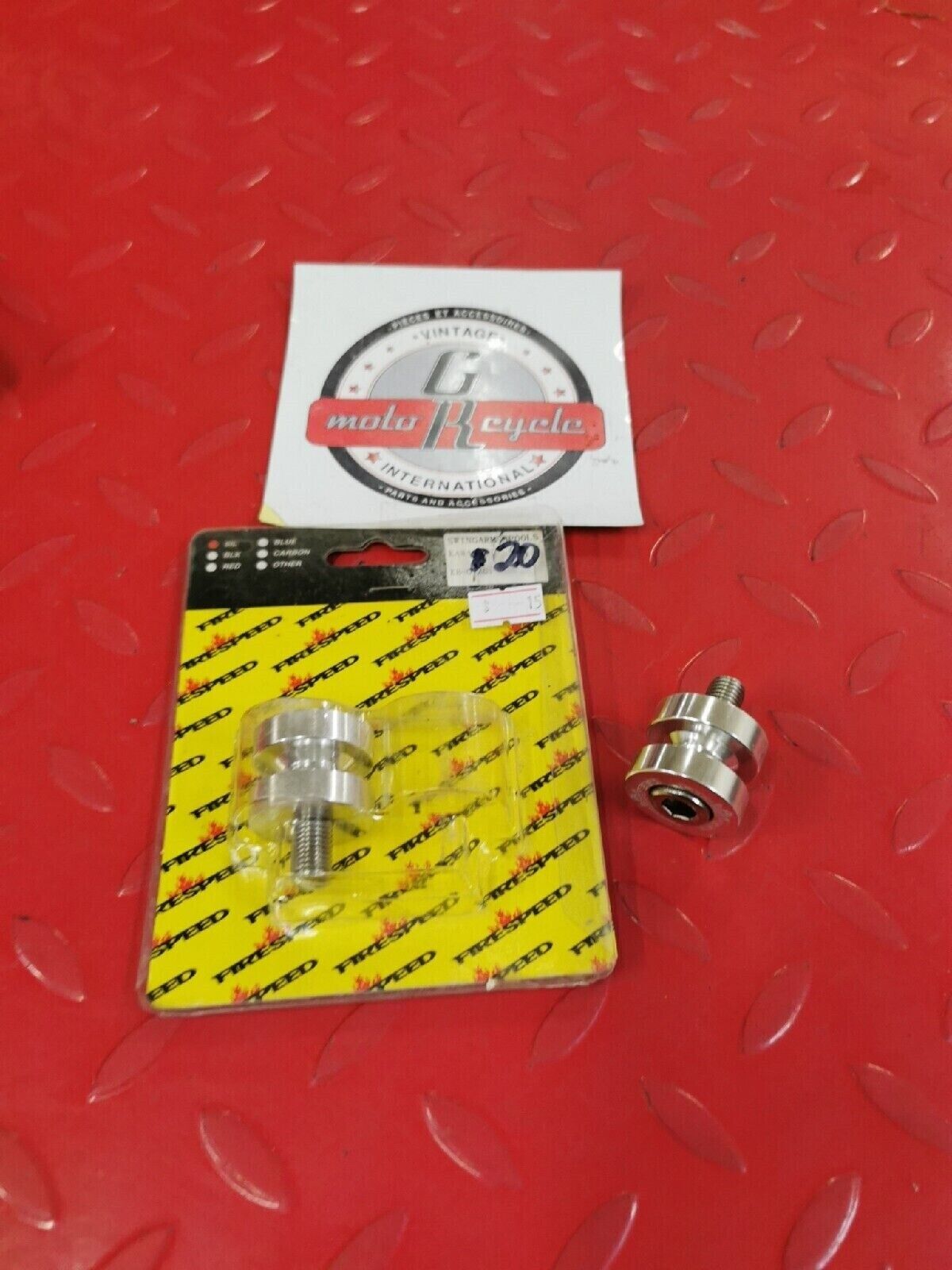NOS FIRESPEED KAWASAKI  SWINGARM SPOOLS  SILVER 092053  J11