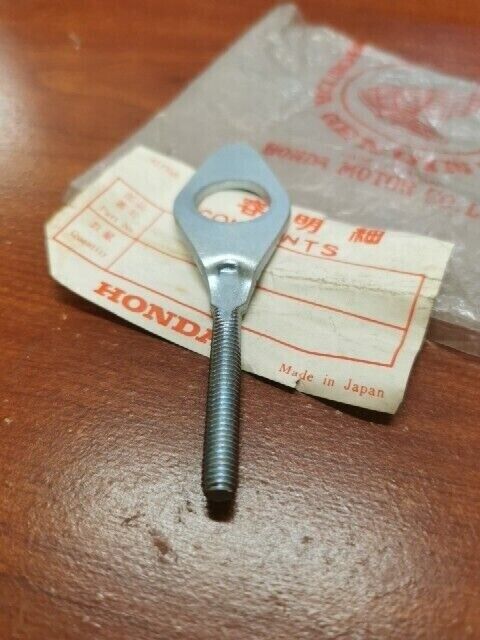 NOS Honda C100 C50 C70 LEFT CHAIN ADJUSTER 40544-035-000 SUB. 95014-10020 H69