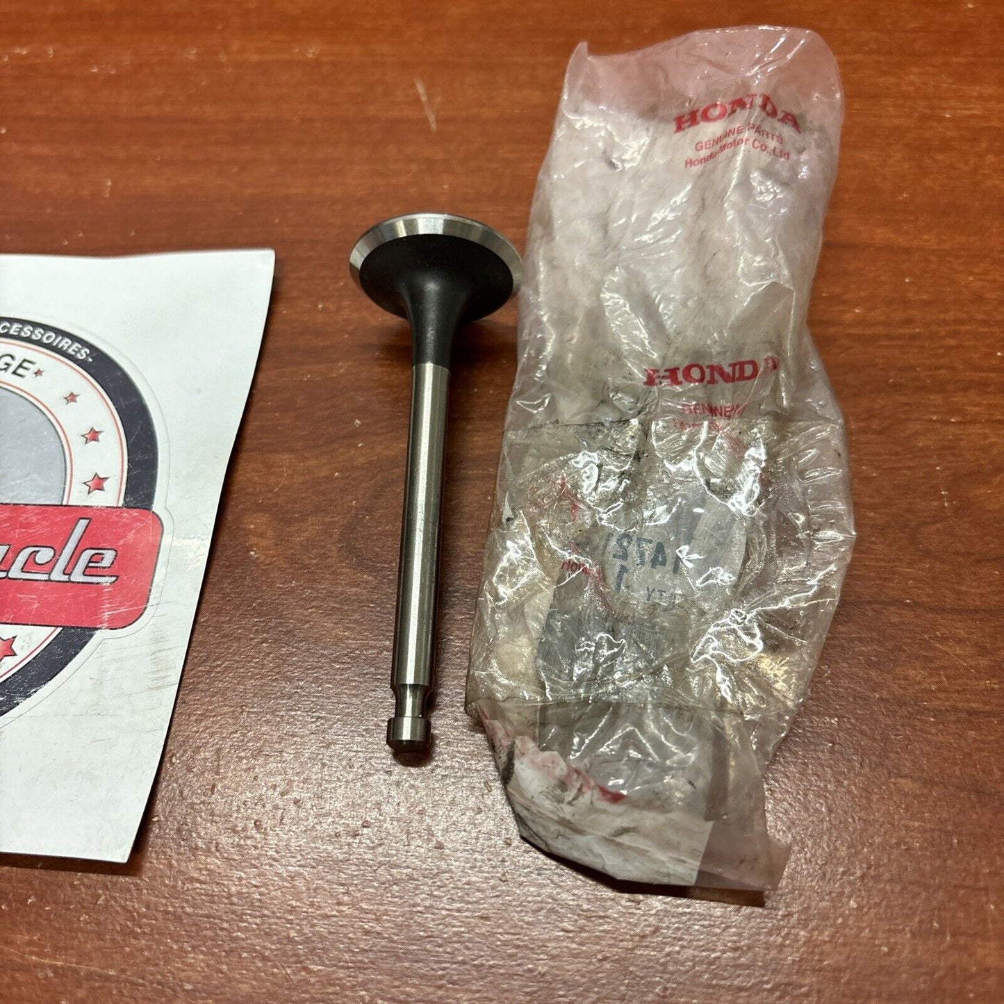 NOS Honda GX340K1 EXHAUST VALVE 14721-ZE3-000 H167