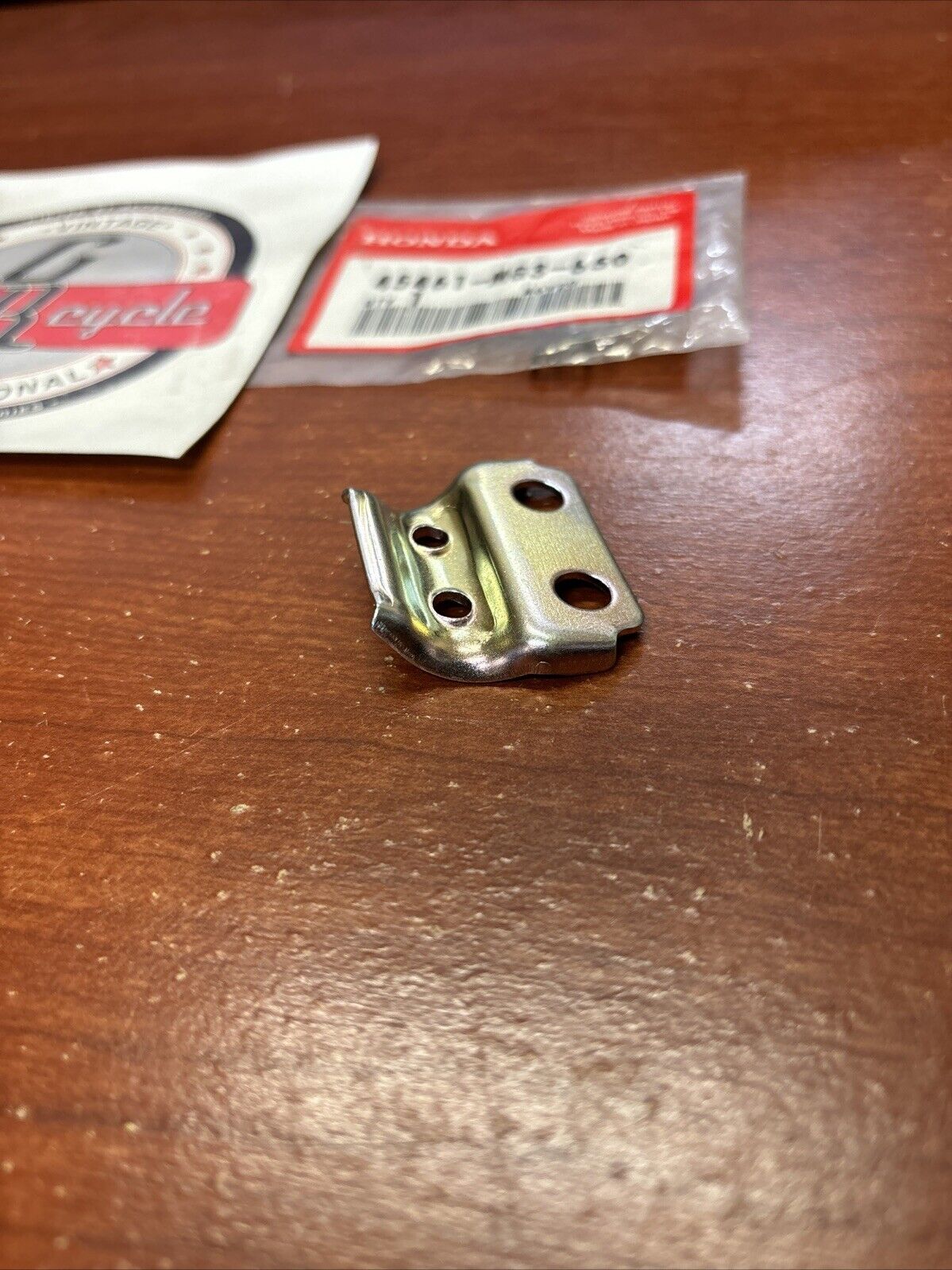 NOS Honda CR80R CRM125R XR250 FRONT BRAKE CABLE CLAMPER A 45461-MG3-650 H161