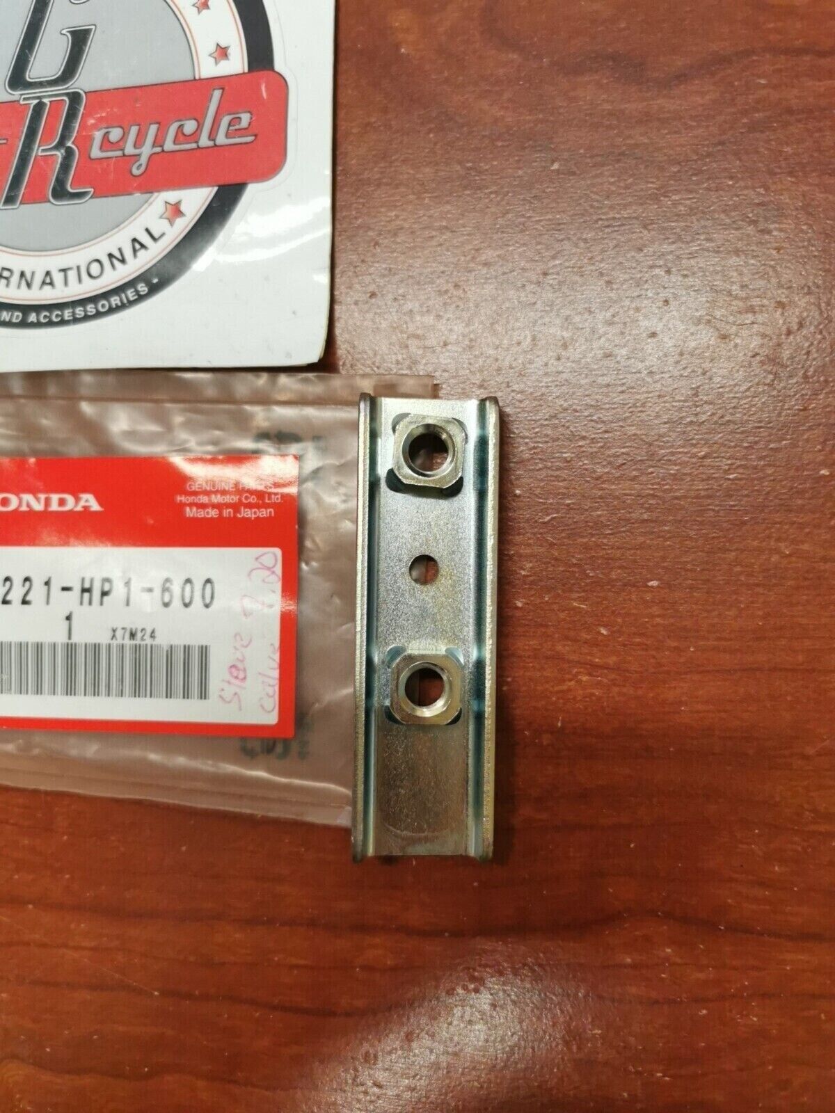 NOS Honda 2006 - 2009 TRX450R 12 - 14 TRX450ER CARRY PIPE STAY 50221-HP1-600 H64