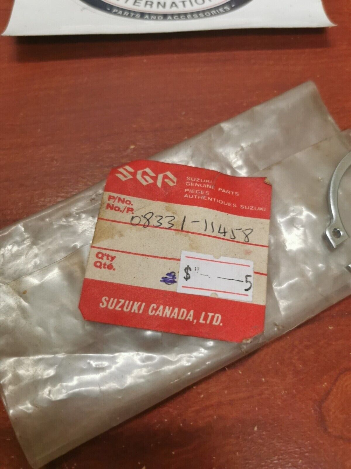 NOS Suzuki MT50 REAR WHEEL CIRCLIP 08331-11458 SUB. 08331-31456 S19