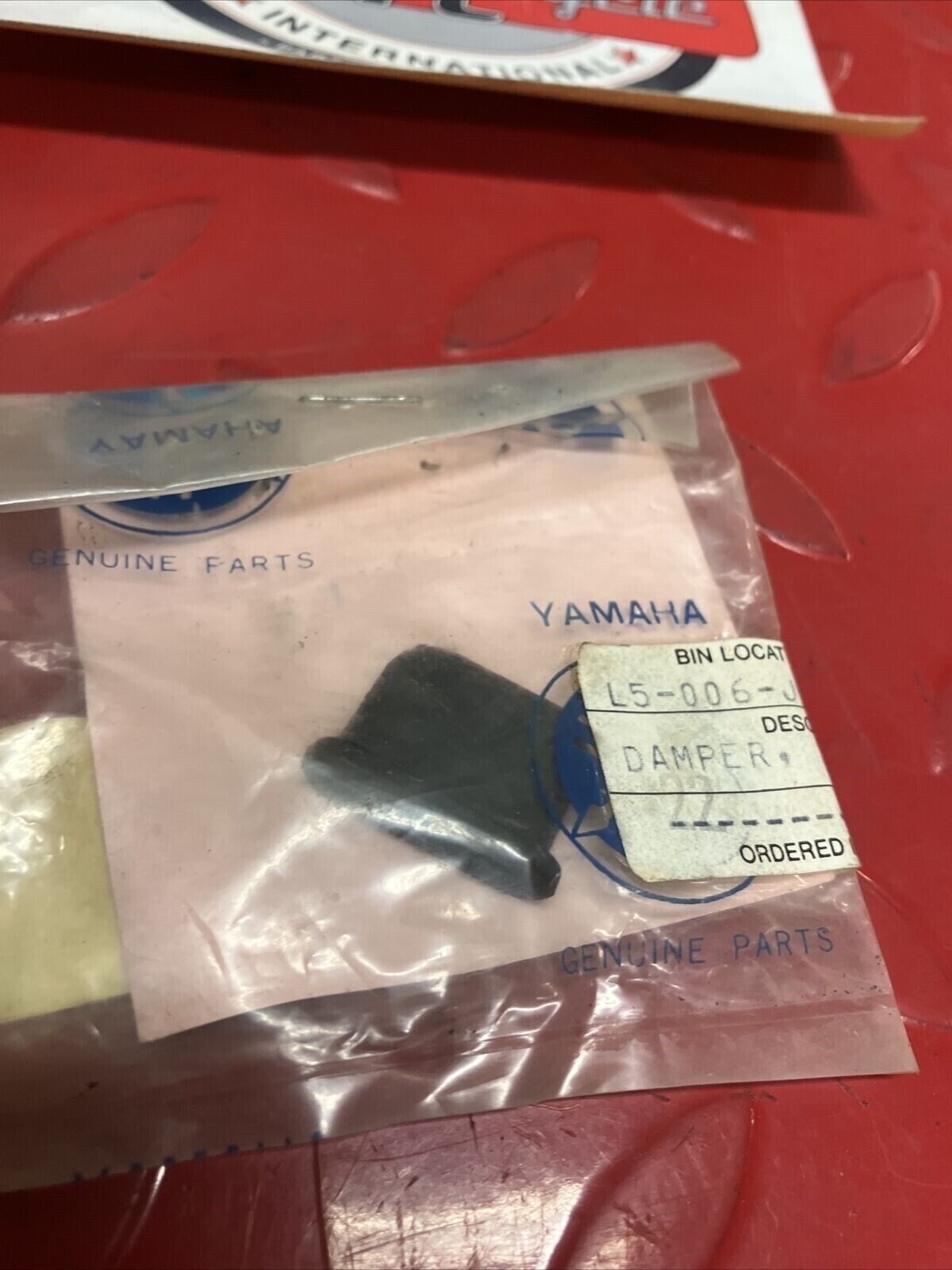 NEW NOS YAMAHA RUBBER DAMPER 437-21717-10-00 Y65
