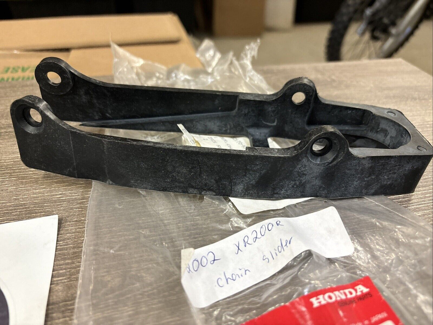 NOS Honda XL250R XL350R XL600 XR200R XR250R CHAIN SLIDER 52170-KK0-771 H137