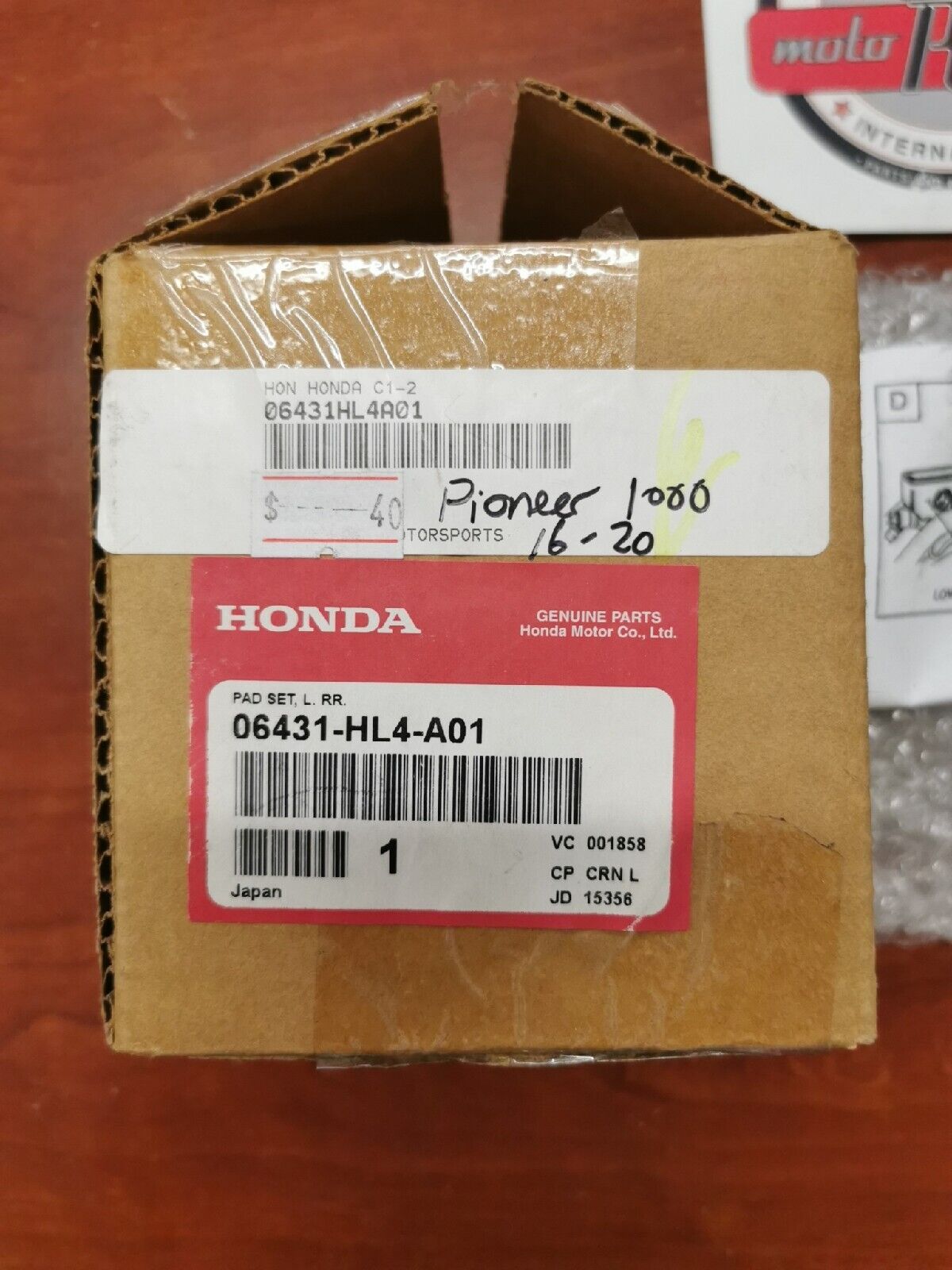 NOS Honda PIONEER 1000 REAR LEFT BRAKE PAD SET 06431-HL4-A01 H35