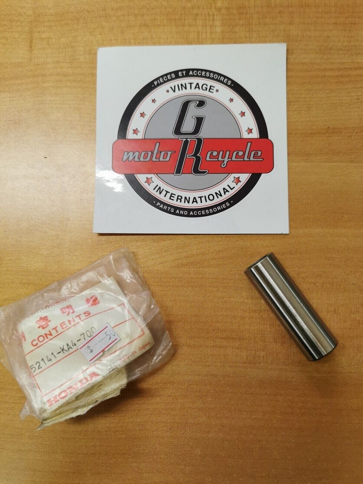 NOS HONDA  CR125 CR250 CR500 1982 - 1984 COLLAR  SWINGARM 52141-KA4-700  H17