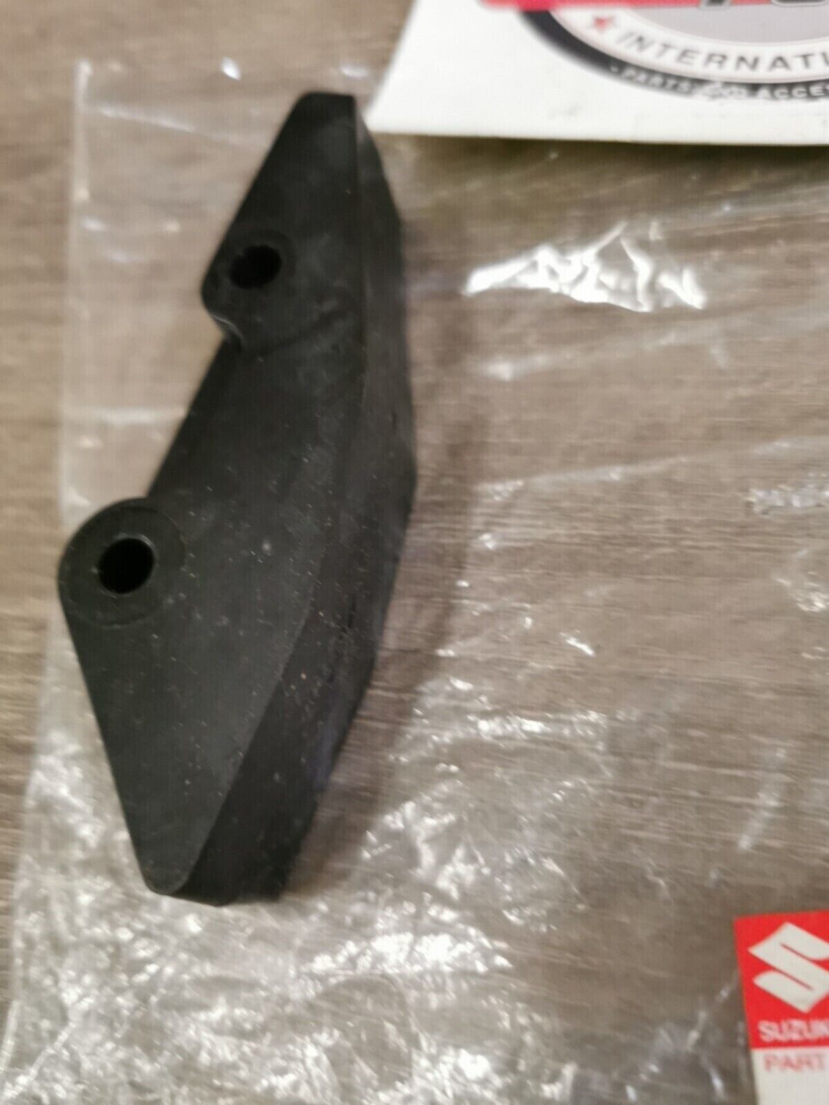 NOS SUZUKI RM125M RM250N RMX250T CHAIN GUIDE DEFENSE 61348-27C20 S23