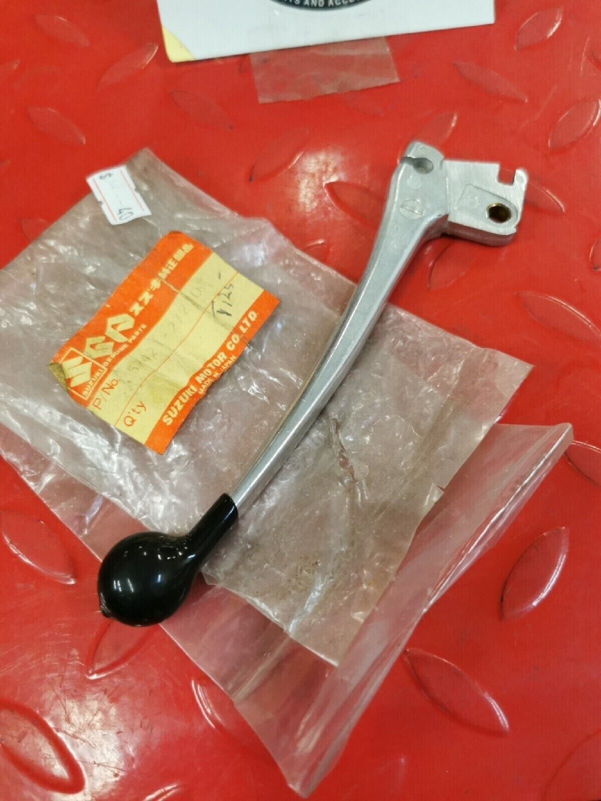 NOS SUZUKI  TS50  1971 - 1974   57421-27210 SUB BY 57421-27212   S12
