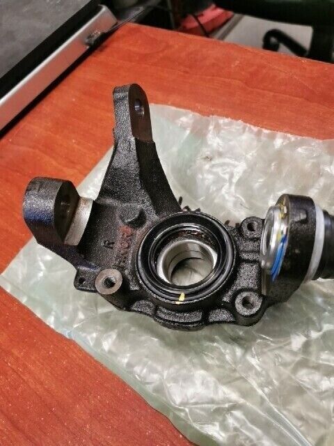 NOS Honda TRX450FE TRX450FM RIGHT STEERING KNUCKLE 51200-HN0-670 H108