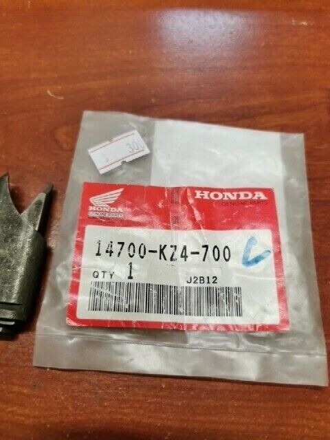 NOS Honda 1990 1991 CR125R LEFT EXHAUST VALVE 14700-KZ4-700 H80