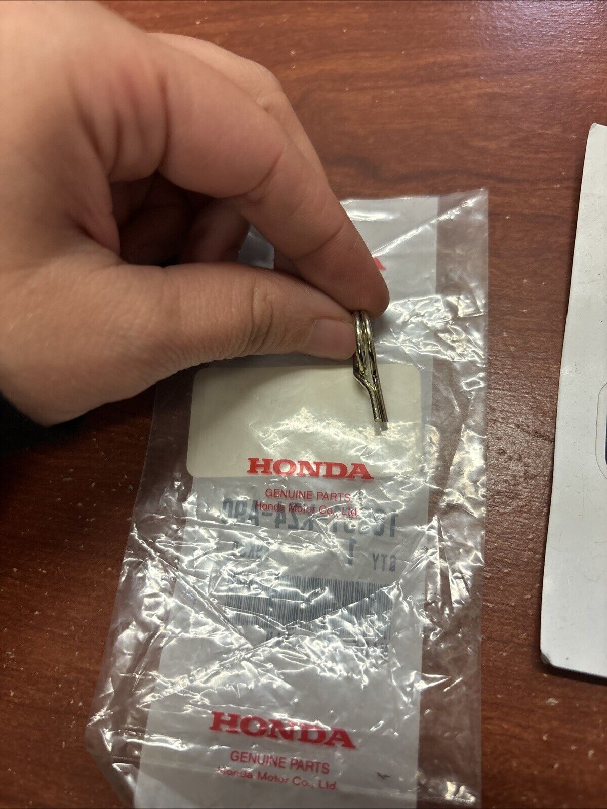 NOS Honda 2000 - 2002 CR125R FLAP VALVE ARM SPRING 18531-KZ4-A90 H144