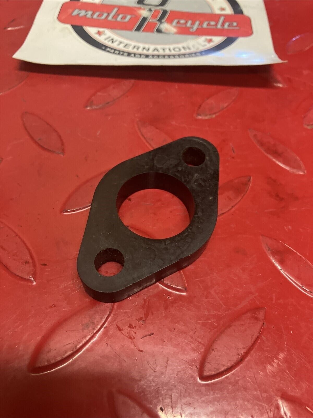 Suzuki RV125 1975 carburetor insulator intake manifold