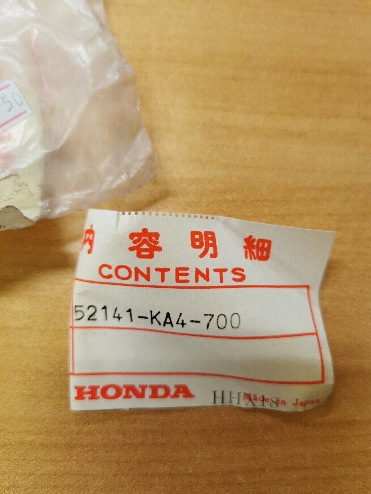 NOS HONDA  CR125 CR250 CR500 1982 - 1984 COLLAR  SWINGARM 52141-KA4-700  H17