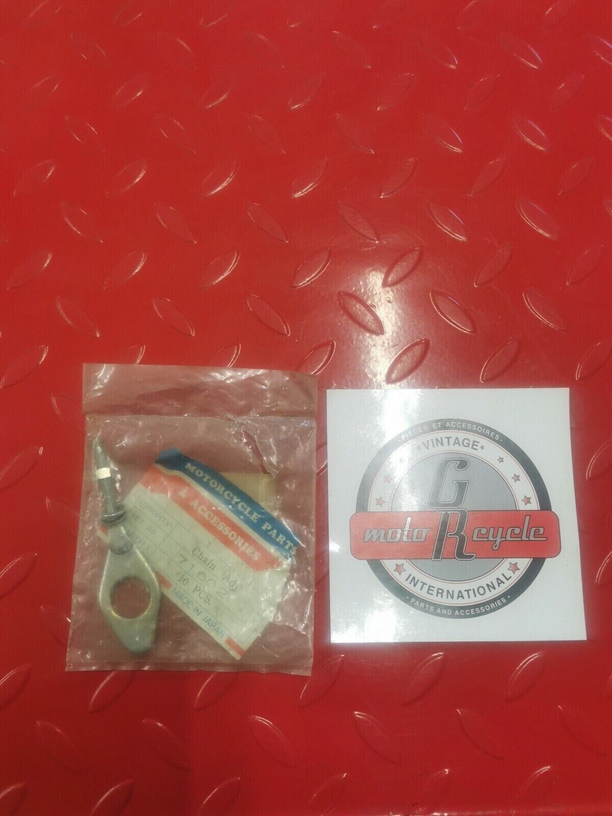 NOS Honda C50 left side drive chain adjuster 40544-041-000 H3