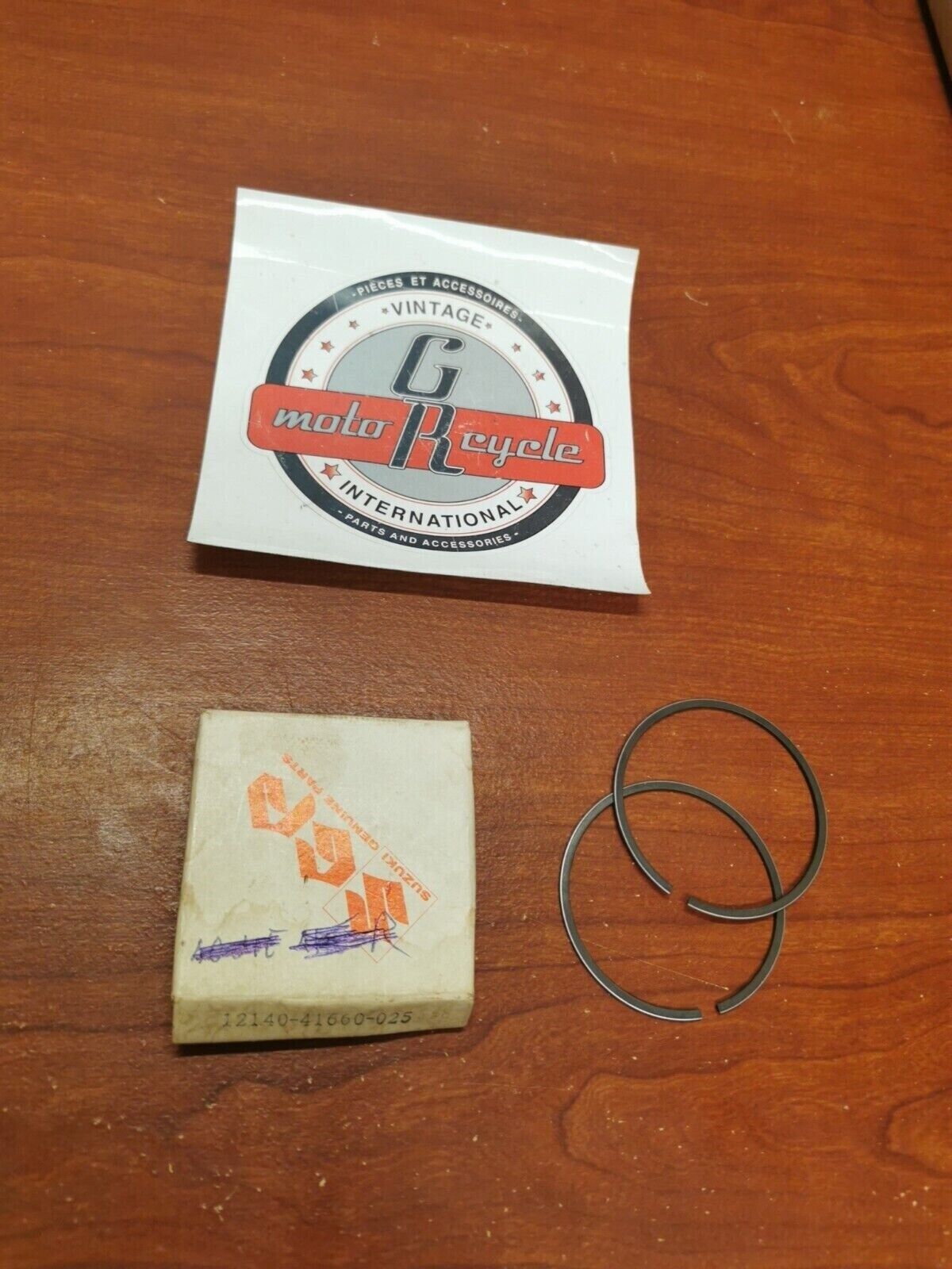 NOS Suzuki RM125B PISTON RING SET 0.25MM 12140-41660-025 S19