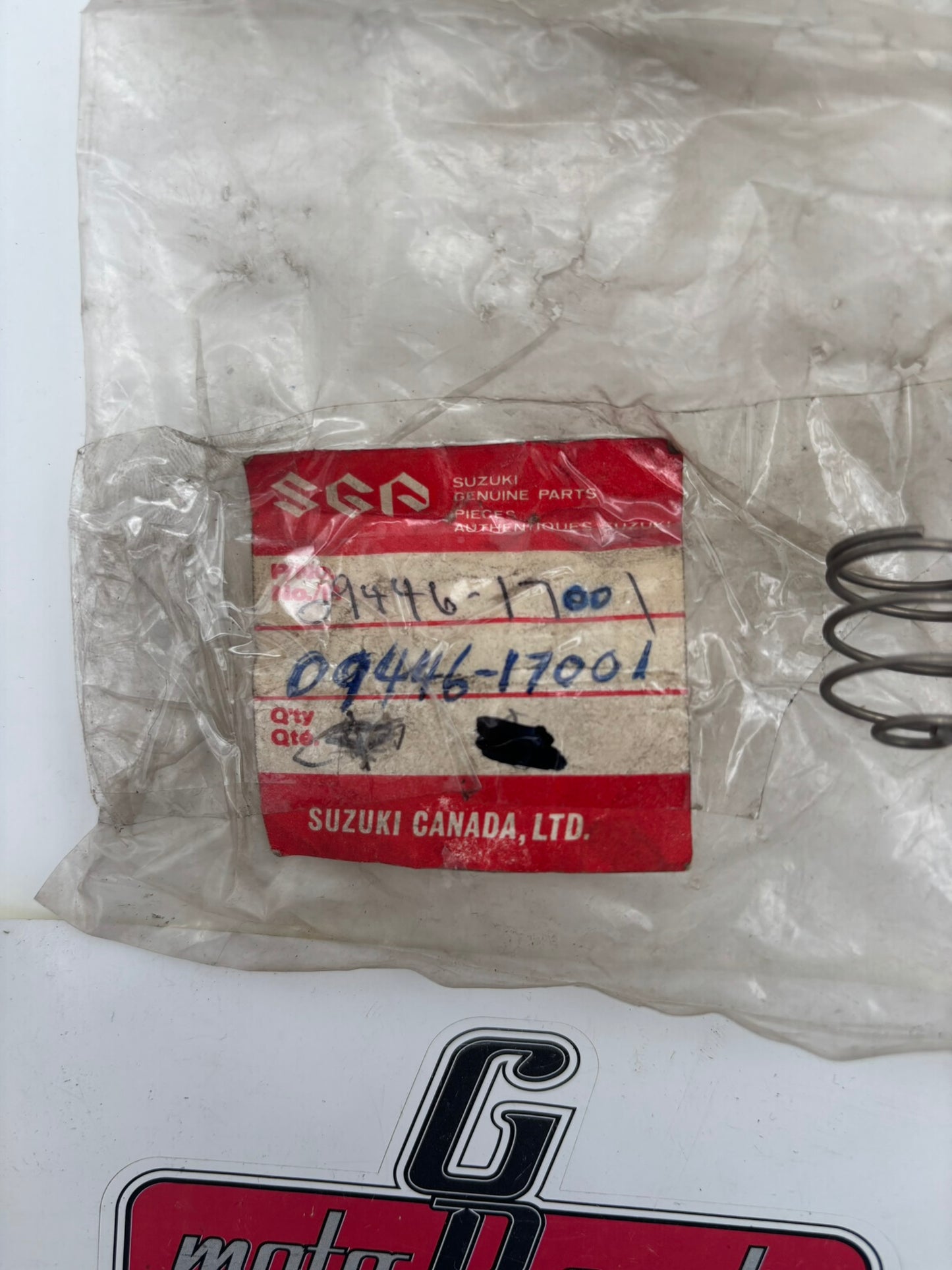 SUZUKI FUEL TANK FLAP SPRING 09446-17001 S63