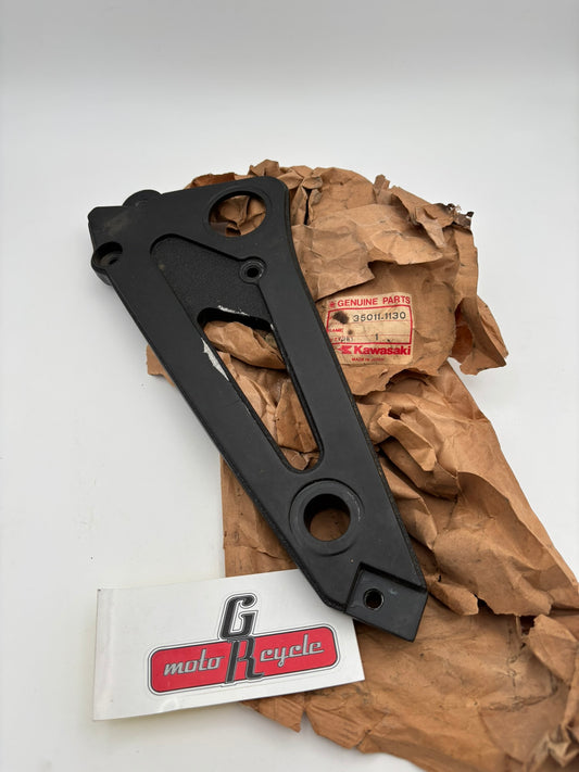 KAWASAKI USED LEFT HAND MUFFLER STAY 35011-1130-U K46