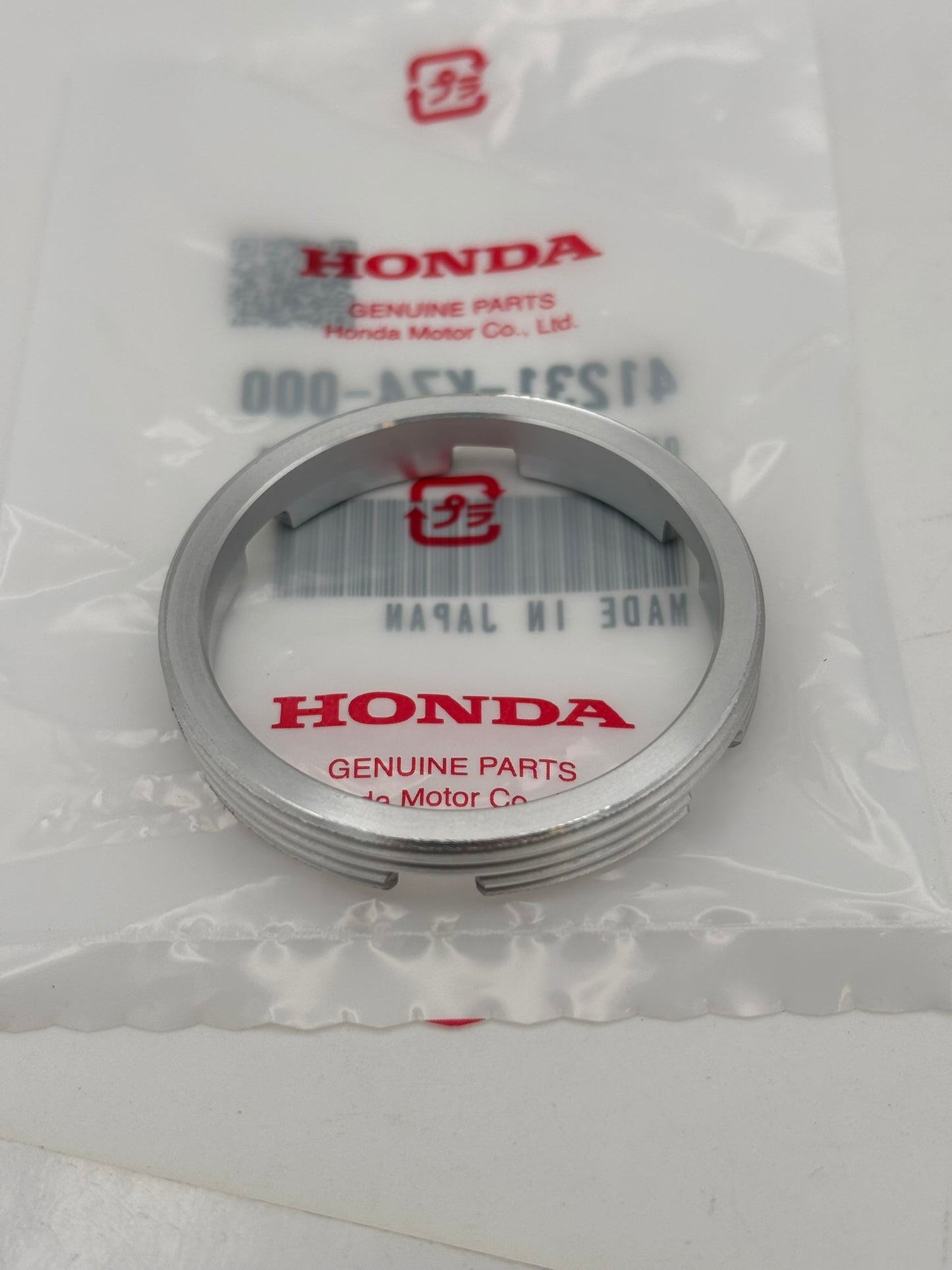 HONDA REAR WHEEL BEARING RETAINER 41231-KZ4-000 H100