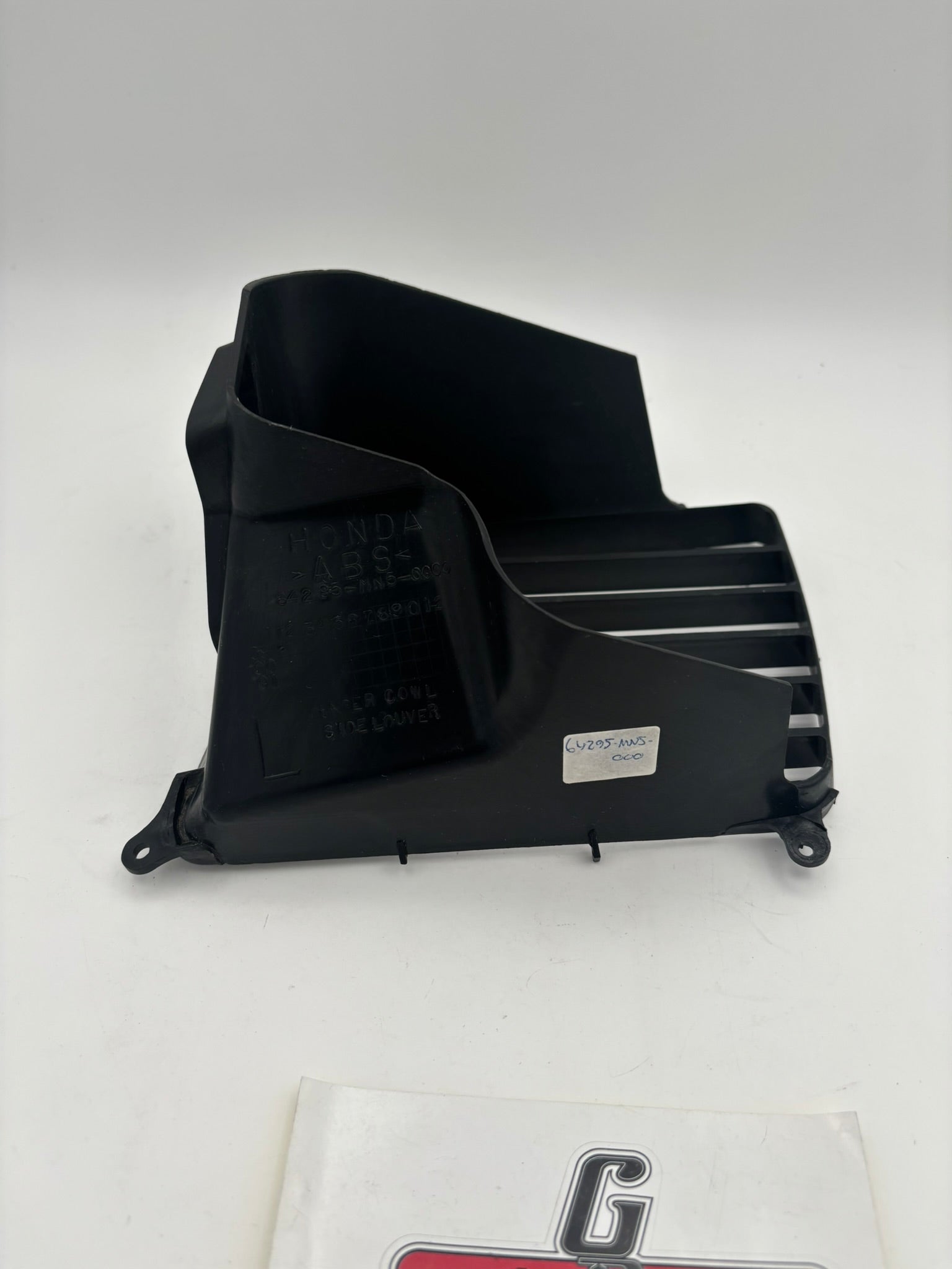 HONDA USED LEFT SIDE COWL LOWER LOUVER 64295-MN5-000-U H242